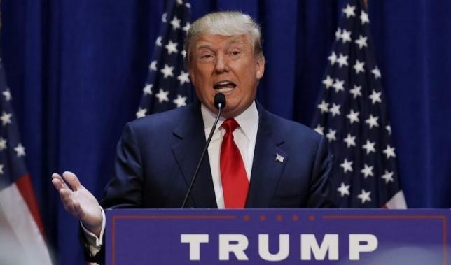 6月16日、米不動産王ドナルド・トランプ氏が2016年の次期大統領選に立候補を表明した。写真はNYのトランプ・タワー・ビルで出馬表明の演説を行う同氏。(2015年 ロイター/Brendan McDermid)